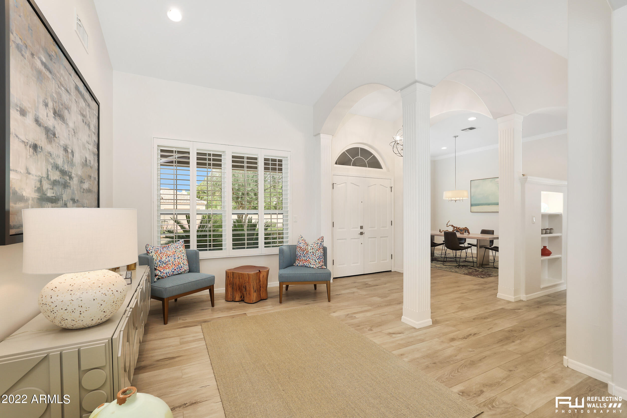 10085 East Doubletree Ranch Road Scottsdale, AZ 85258 - Photo 4 of 62 a living room with furniture and a large window