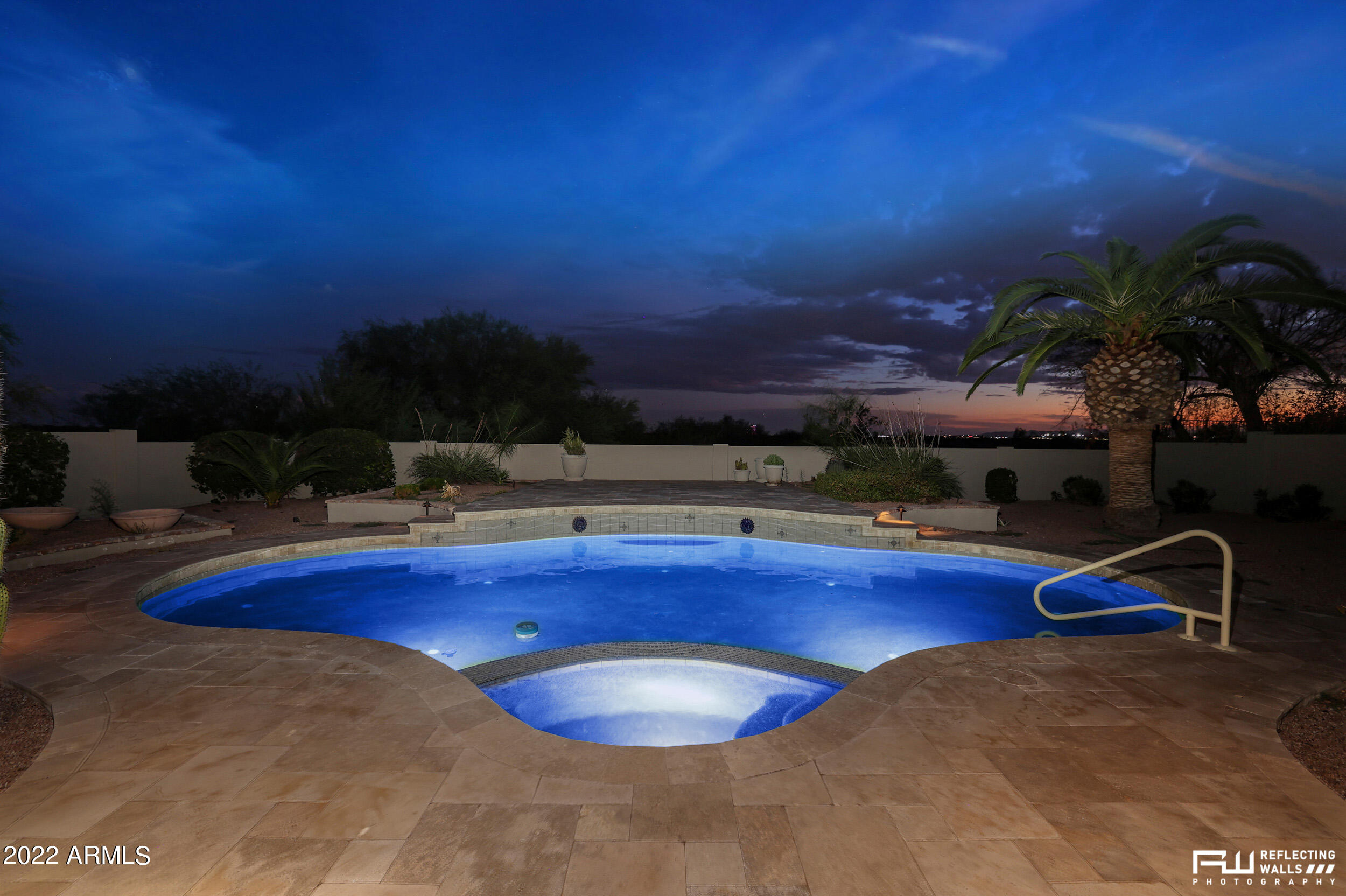 10085 East Doubletree Ranch Road Scottsdale, AZ 85258 - Photo 49 of 62 a view of a swimming pool with an outdoor space and seating area