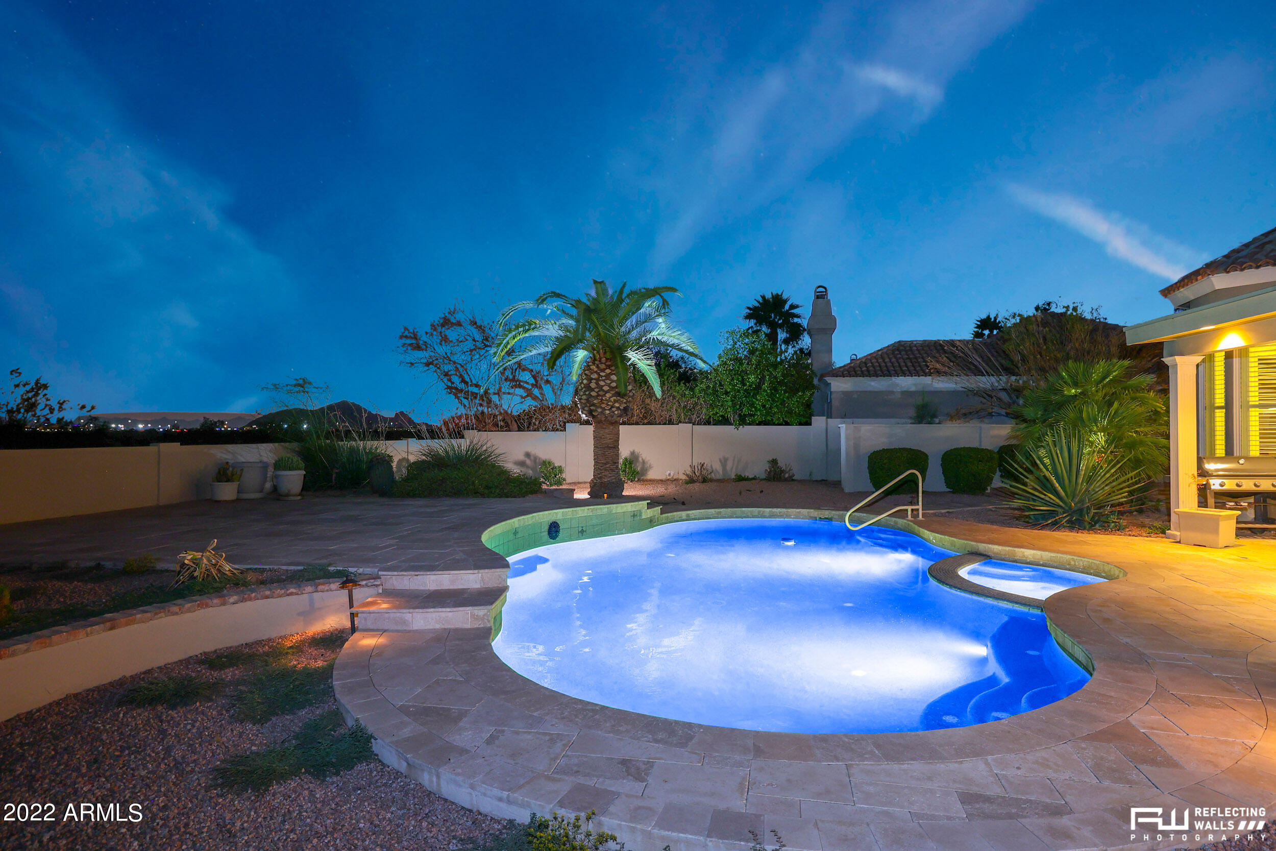 10085 East Doubletree Ranch Road Scottsdale, AZ 85258 - Photo 53 of 62 a view of a swimming pool with an outdoor space and seating area