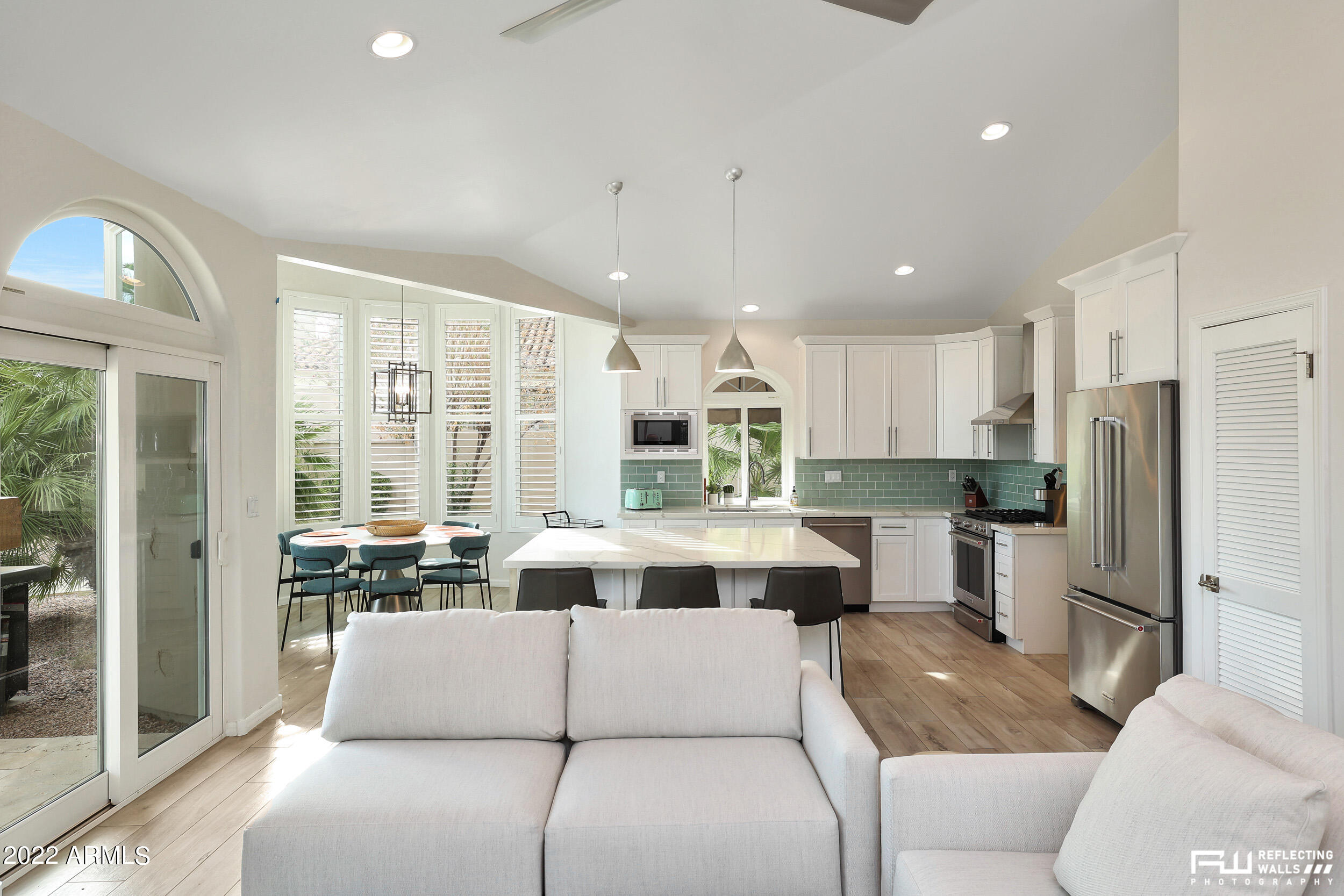 10085 East Doubletree Ranch Road Scottsdale, AZ 85258 - Photo 8 of 62 a living room with stainless steel appliances furniture and a large window