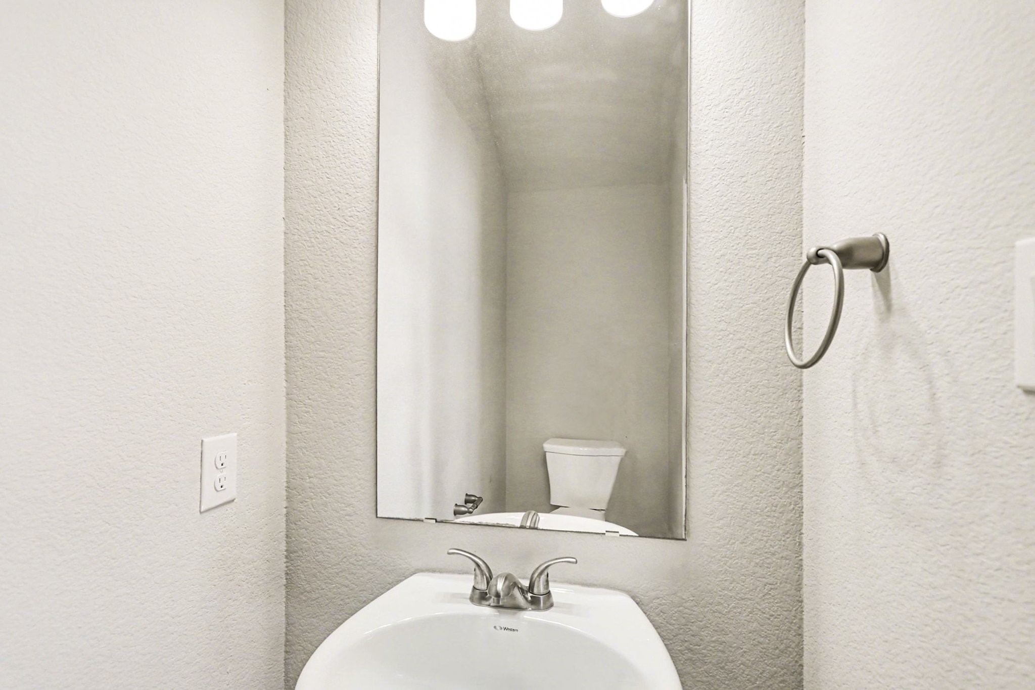 19602 Pradera Meadows Loop Rosharon, TX 77583 - Photo 13 of 47 a bathroom with a sink vanity and a mirror