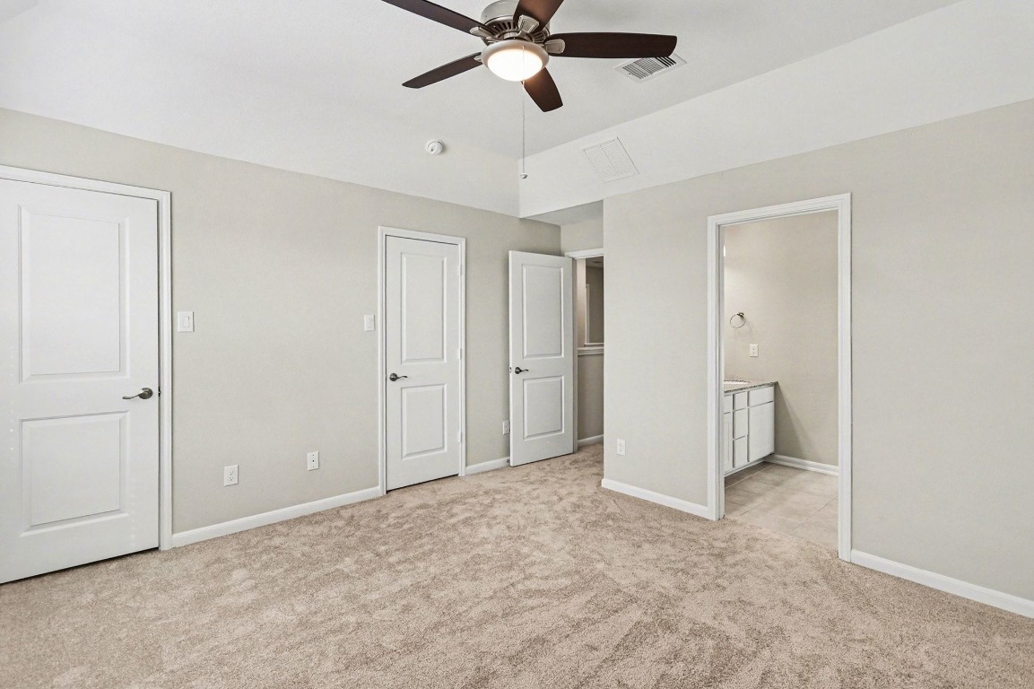 19602 Pradera Meadows Loop Rosharon, TX 77583 - Photo 20 of 47 a view of an empty room and chandelier fan