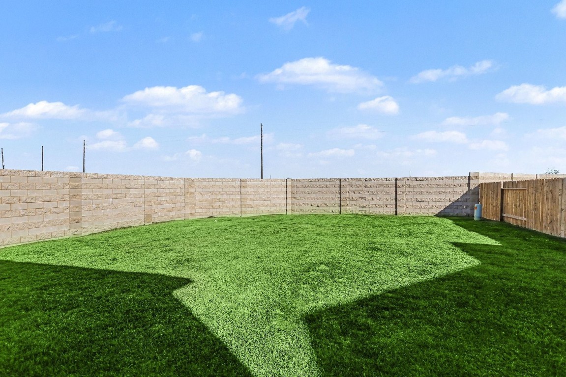 19602 Pradera Meadows Loop Rosharon, TX 77583 - Photo 29 of 47 a view of a field with sitting space and fence