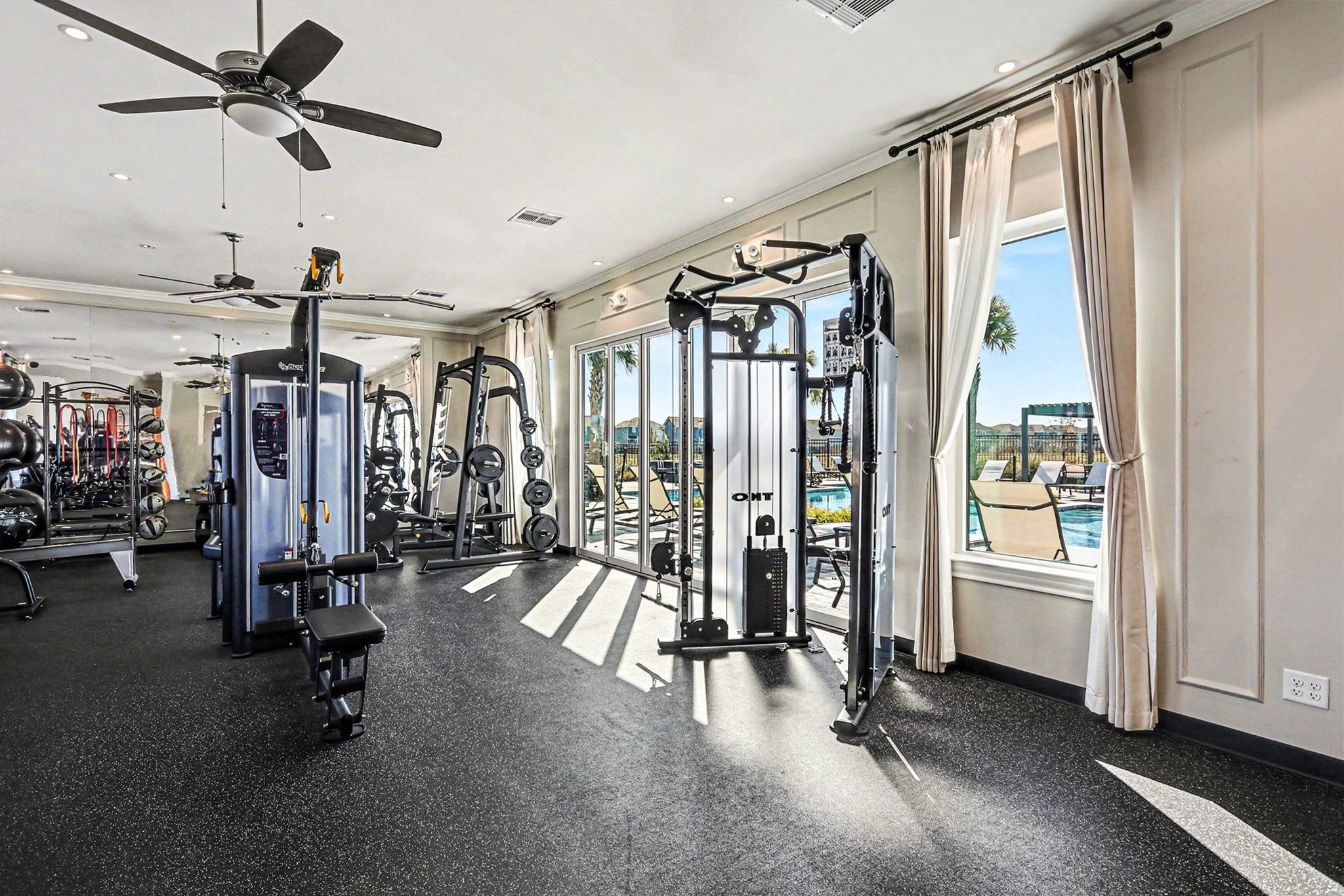 19602 Pradera Meadows Loop Rosharon, TX 77583 - Photo 37 of 47 a view of a room with gym equipment