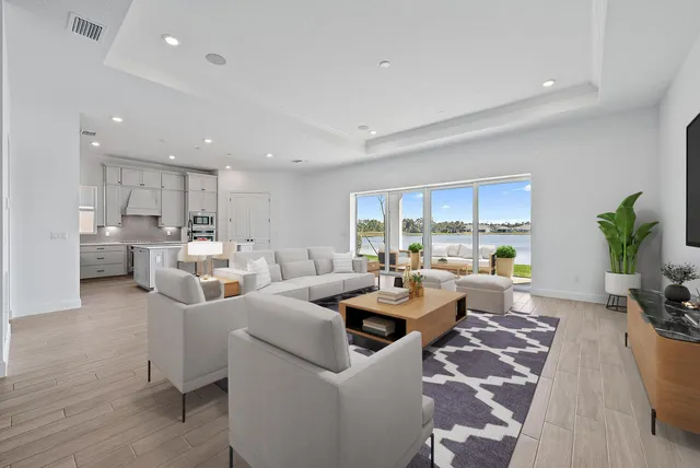 a living room with furniture and a table