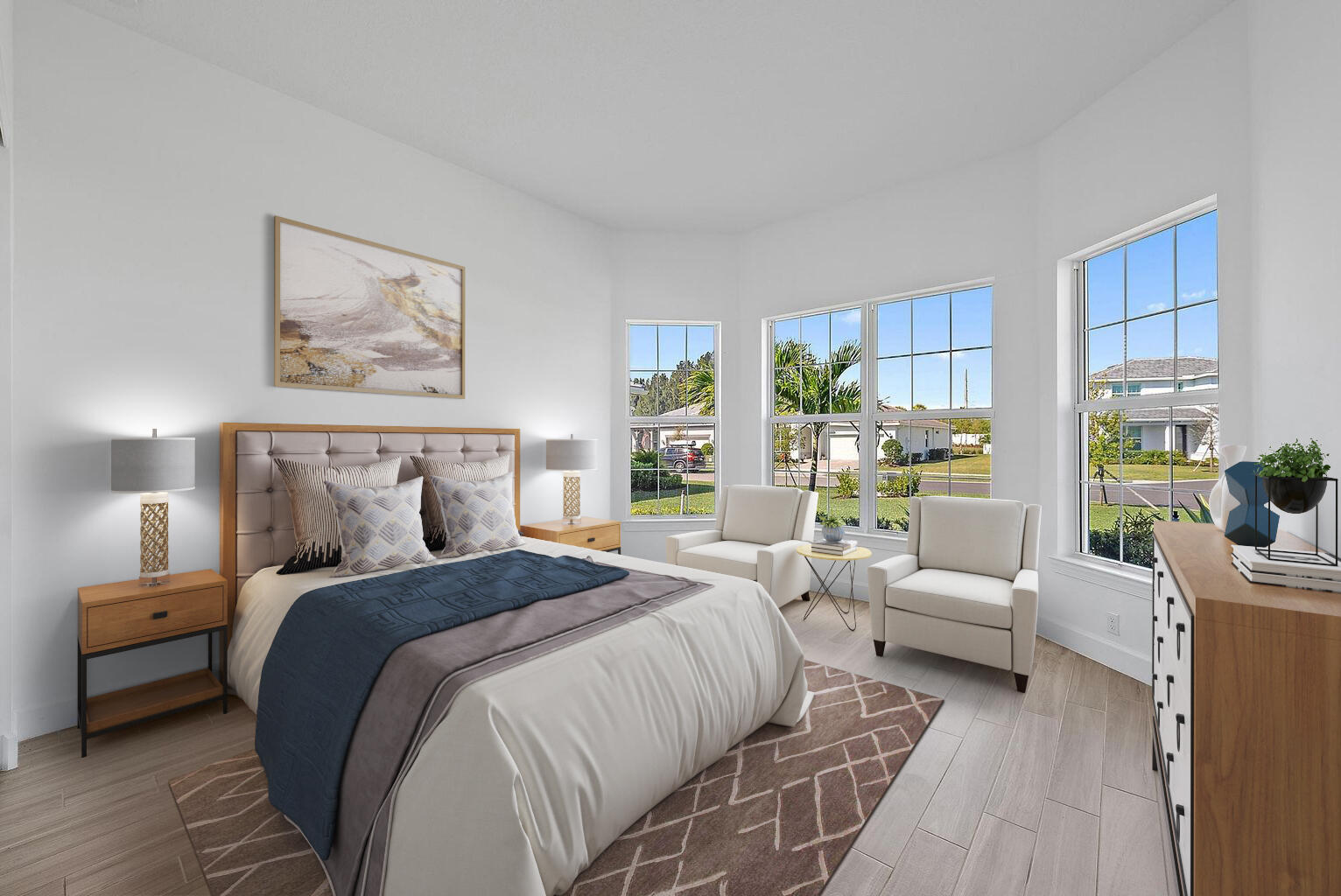 9801 Southwest Legacy Drive Stuart, FL 34997 - Photo 19 of 46 a bedroom with a large bed and a couch