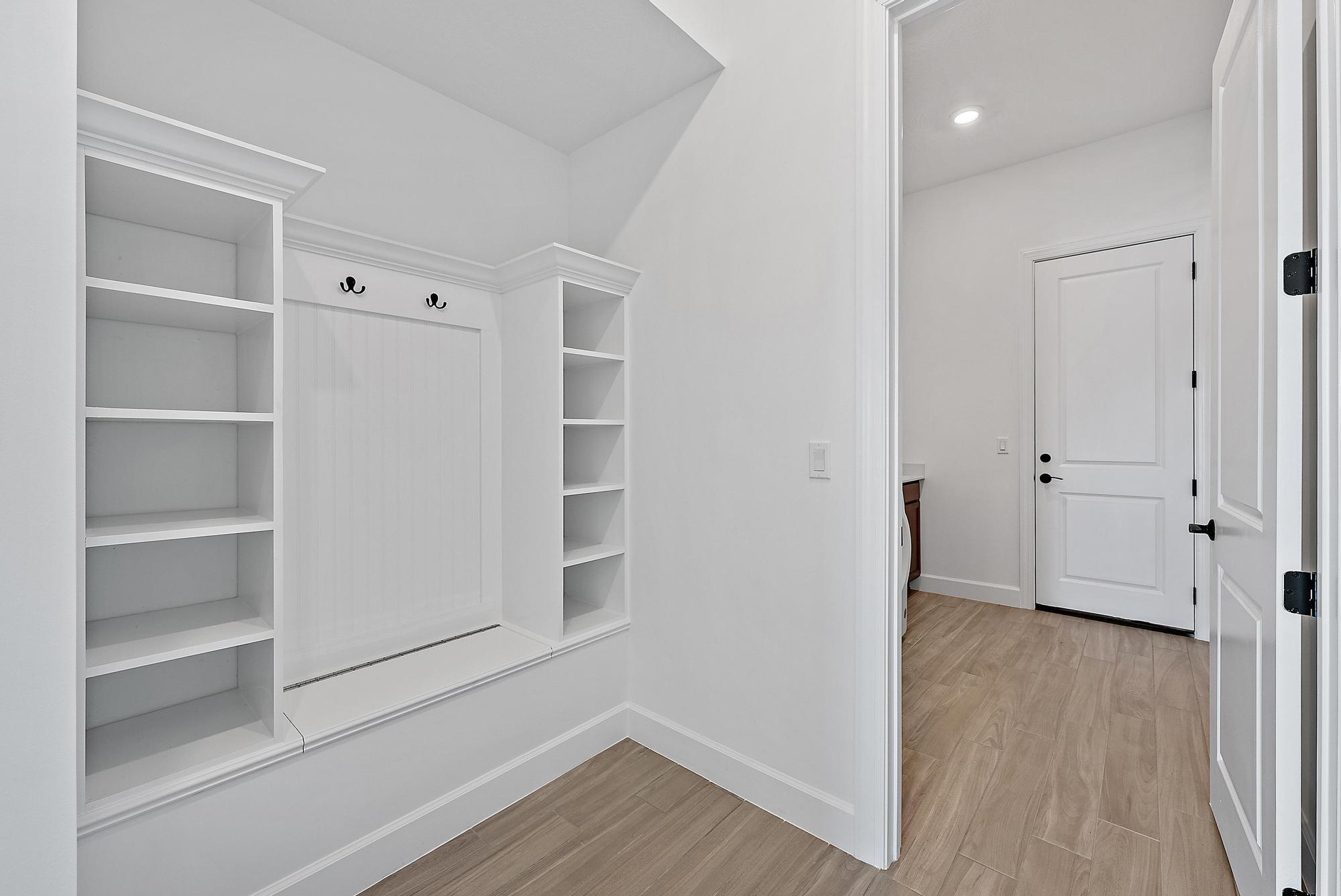 9801 Southwest Legacy Drive Stuart, FL 34997 - Photo 23 of 46 a view of empty room with wooden floor