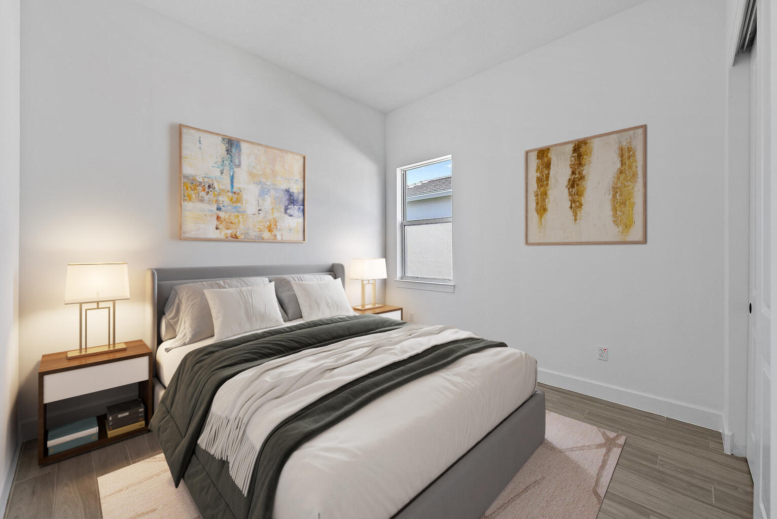 9801 Southwest Legacy Drive Stuart, FL 34997 - Photo 25 of 46 a bedroom with a bed and a painting on the wall