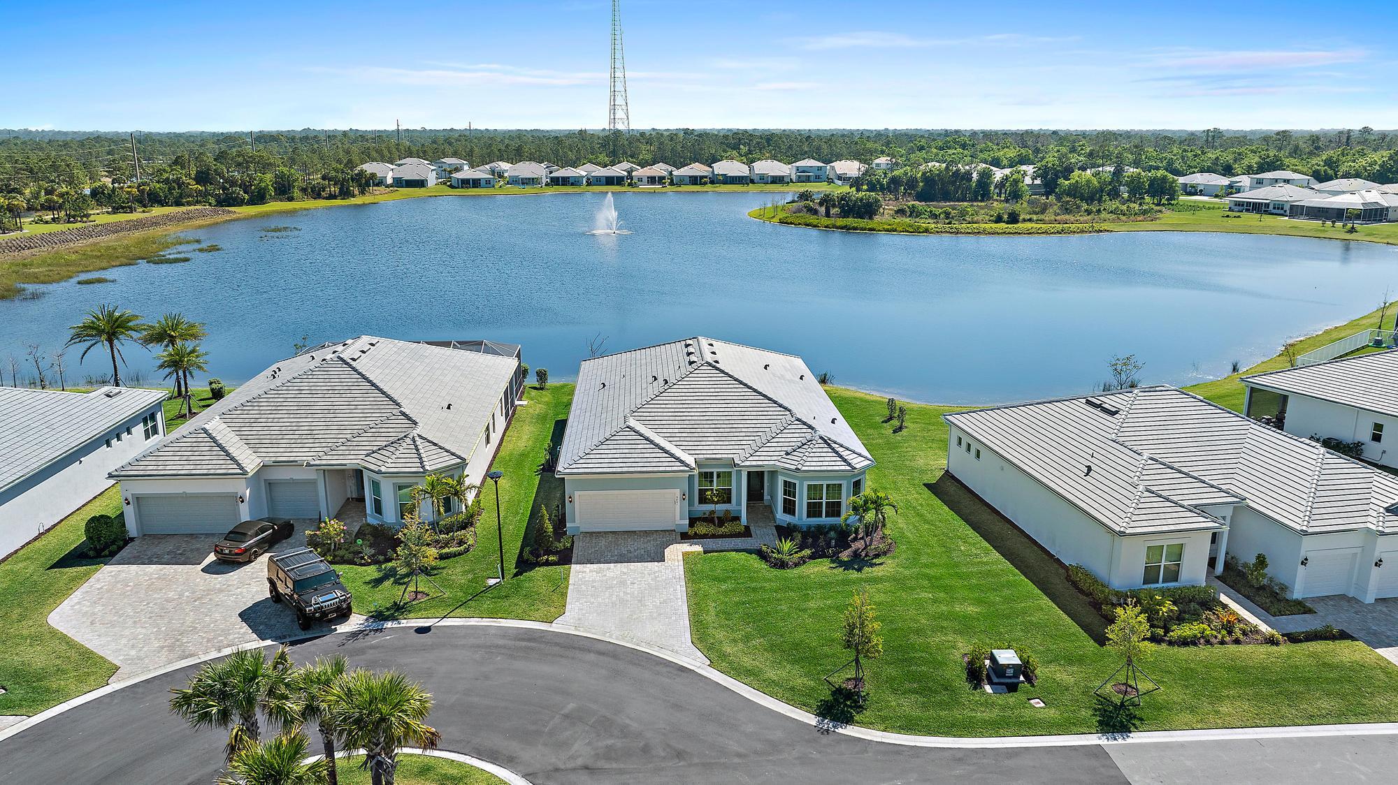 9801 Southwest Legacy Drive Stuart, FL 34997 - Photo 38 of 46 an aerial view of a house with a lake view