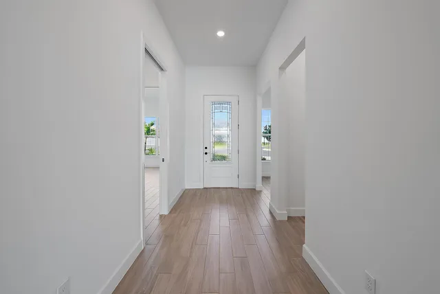 a view of wooden floor in an empty room