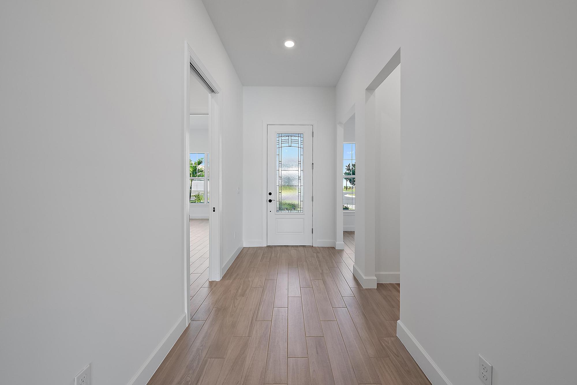 9801 Southwest Legacy Drive Stuart, FL 34997 - Photo 4 of 46 a view of wooden floor in an empty room