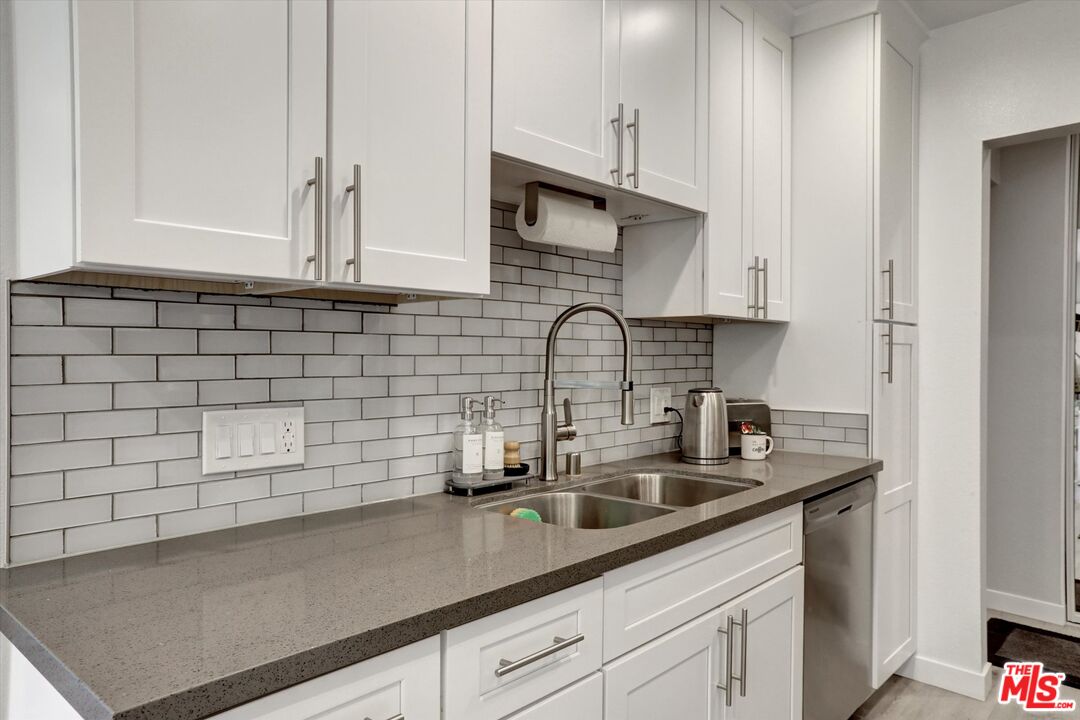 7300 Franklin Avenue, Unit 346 Los Angeles, CA 90046 - Photo 11 of 22 a kitchen with a sink and cabinets