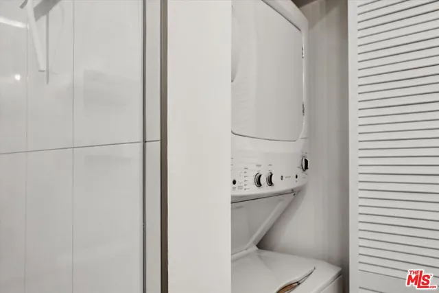 a bathroom with a sink toilet and tub