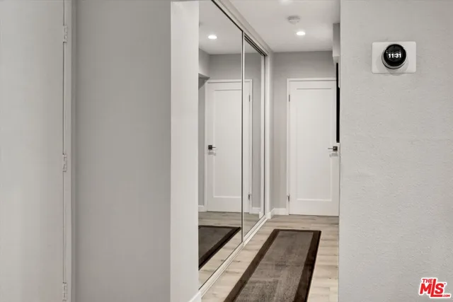 a bathroom with a tub and shower