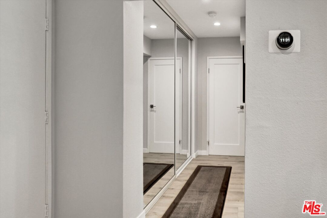 7300 Franklin Avenue, Unit 346 Los Angeles, CA 90046 - Photo 21 of 22 a bathroom with a tub and shower