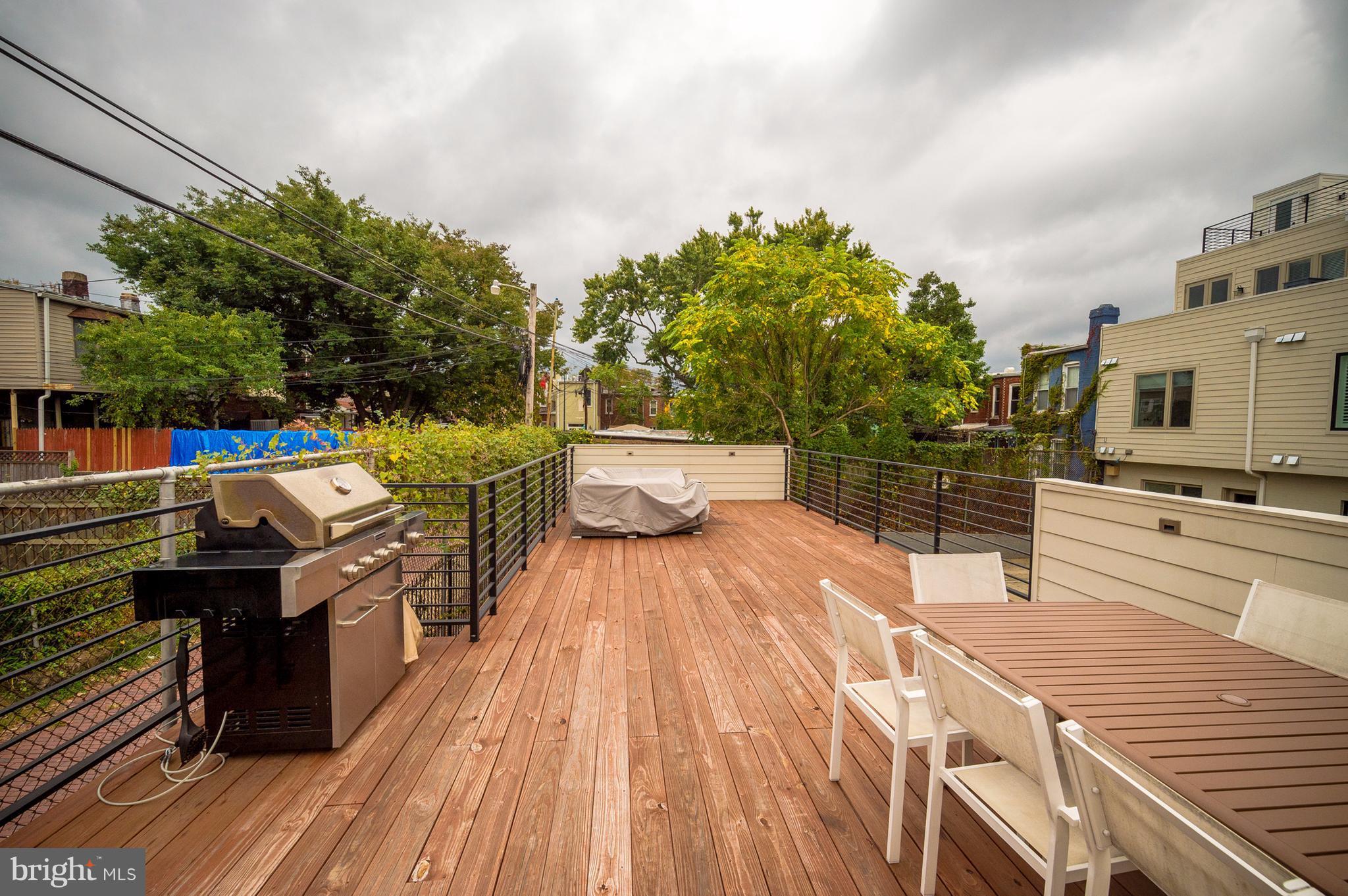901 D Street Northeast, Unit 1 Washington, DC 20002 - Photo 16 of 22 Community BBQ and large deck