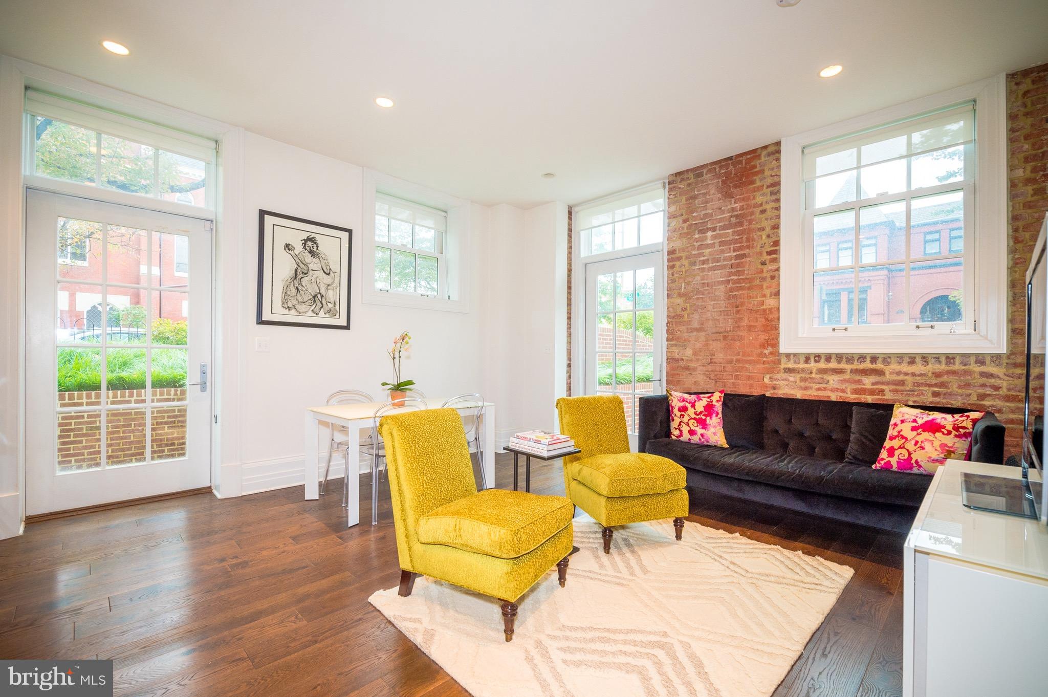 901 D Street Northeast, Unit 1 Washington, DC 20002 - Photo 5 of 22 Sunny, open living room