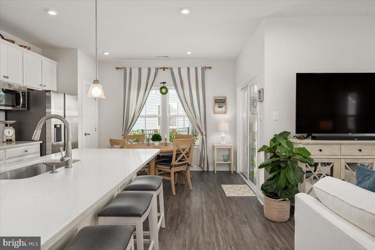 65 Old Forge Drive Ocean View, DE 19970 - Photo 11 of 69 a living room with furniture and a flat screen tv
