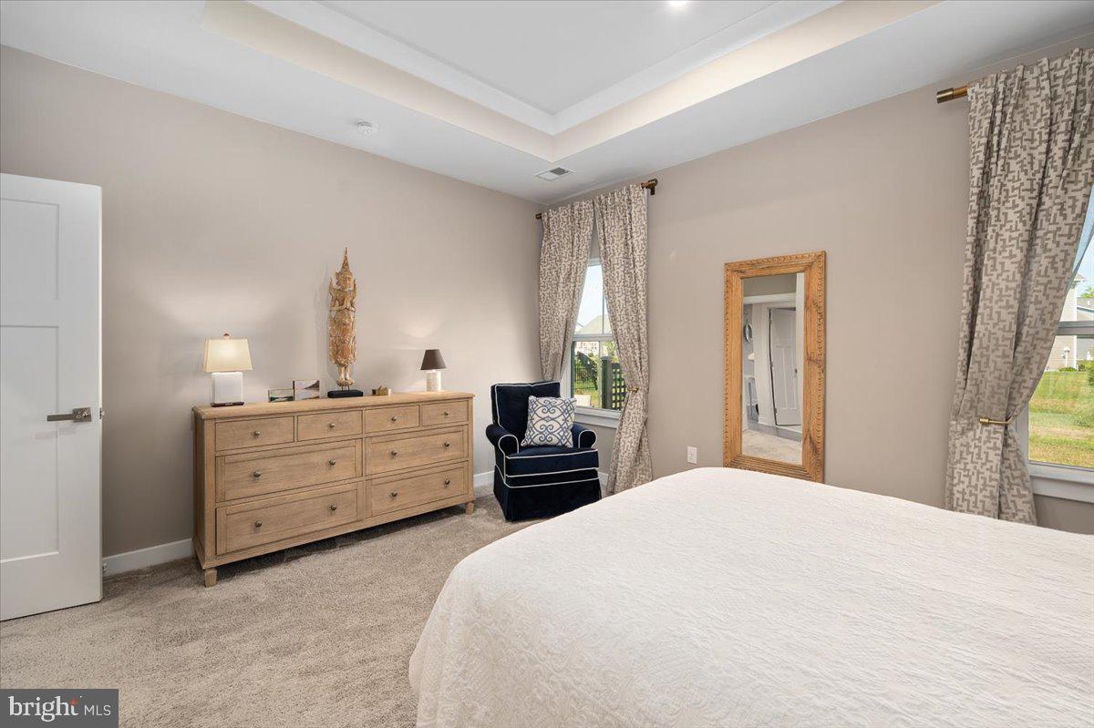 65 Old Forge Drive Ocean View, DE 19970 - Photo 21 of 69 a bedroom with a bed and a dresser