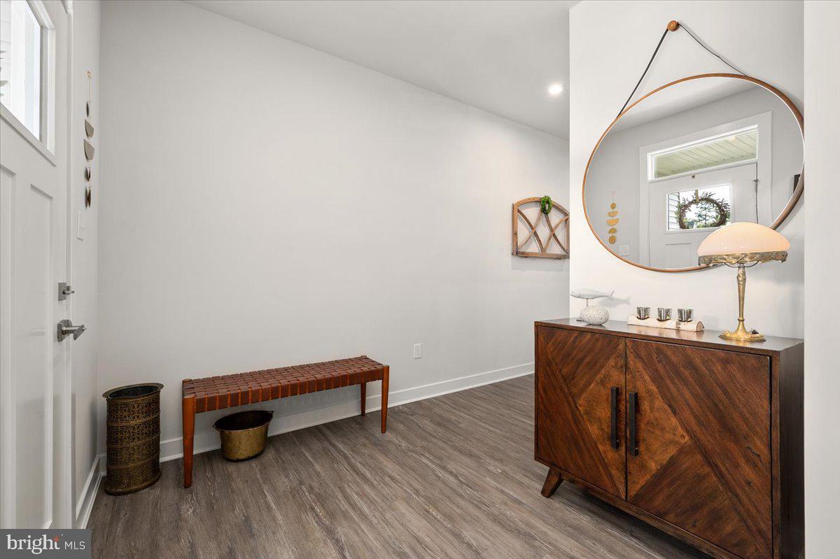 65 Old Forge Drive Ocean View, DE 19970 - Photo 28 of 69 a room with a table and wooden floor