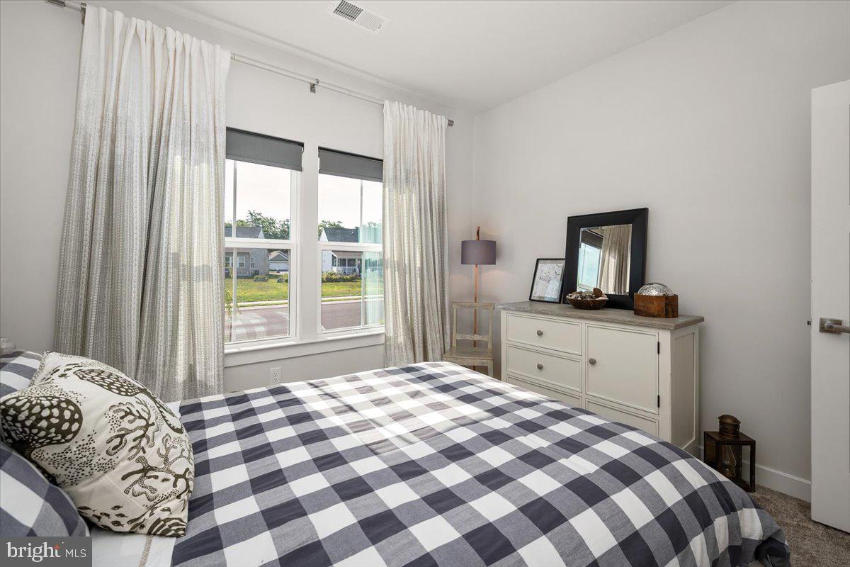 65 Old Forge Drive Ocean View, DE 19970 - Photo 35 of 69 a bedroom with a bed and a window