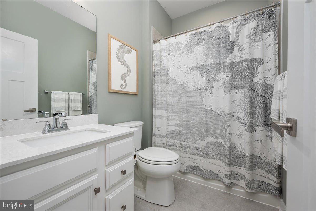 65 Old Forge Drive Ocean View, DE 19970 - Photo 37 of 69 a bathroom with a sink toilet vanity and shower