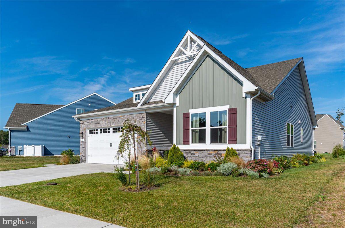 65 Old Forge Drive Ocean View, DE 19970 - Photo 58 of 69 a front view of a house with a yard