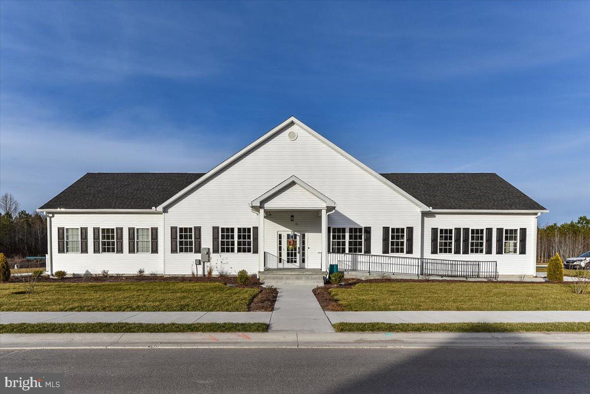 65 Old Forge Drive Ocean View, DE 19970 - Photo 65 of 69 a front view of a house with a garden