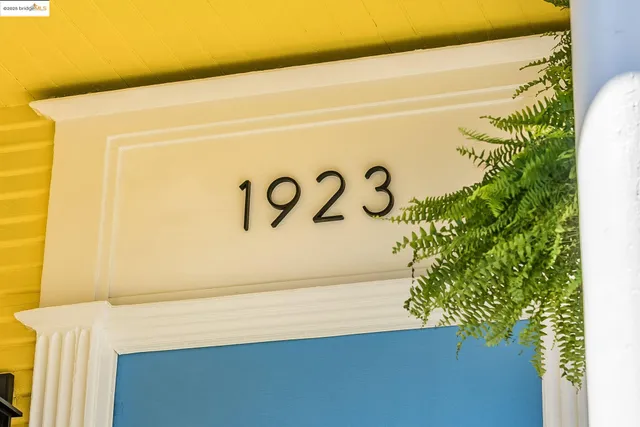 a close up of a wall with a sign on it