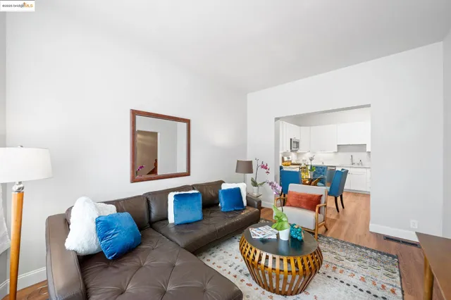 a living room with furniture and a table