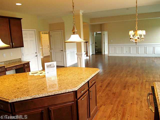 6624 Stonecroft Drive Oak Ridge, NC 27310 - Photo 13 of 16 Kitchen. Triangular Kitchen Island