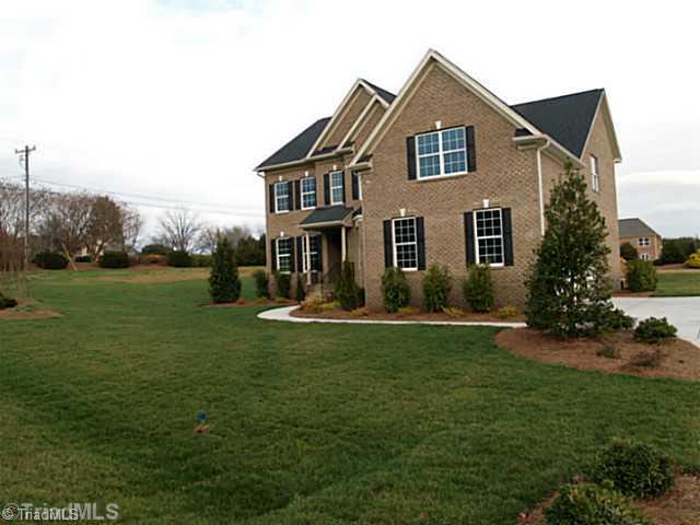6624 Stonecroft Drive Oak Ridge, NC 27310 - Photo 4 of 16 Exterior Front.