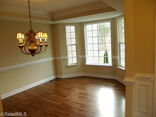 6624 Stonecroft Drive Oak Ridge, NC 27310 - Photo 6 of 16 Dining Room. Dining Room Featuring Bay Window