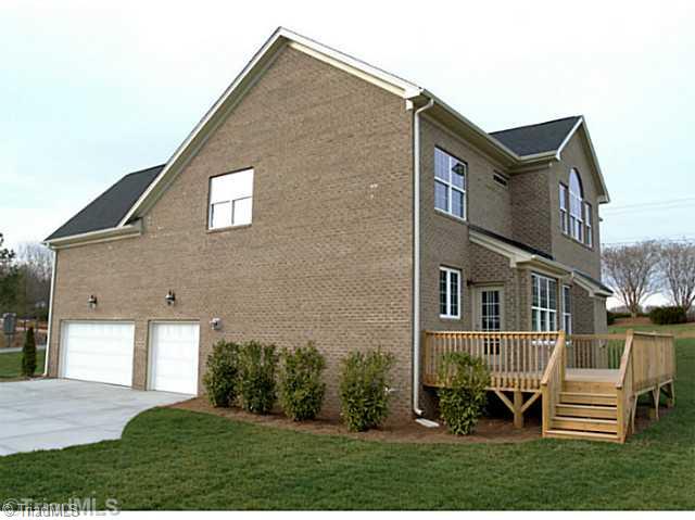 6624 Stonecroft Drive Oak Ridge, NC 27310 - Photo 9 of 16 Exterior Front.
