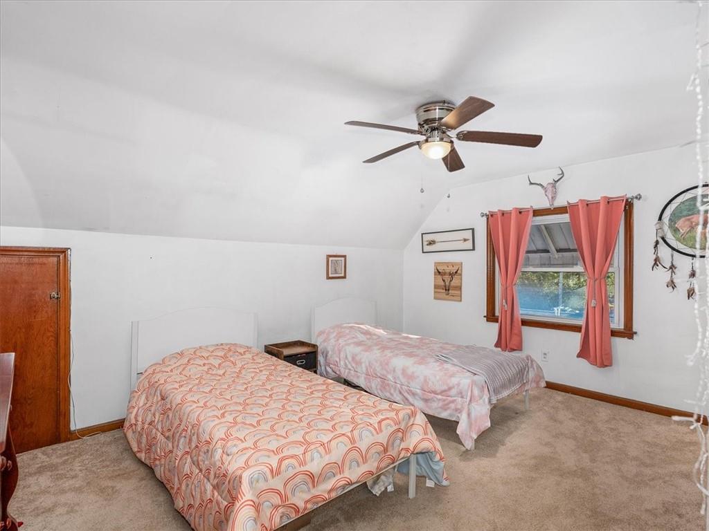 185 Highway 68 Rochester, PA 15074 - Photo 18 of 29 a bedroom with two beds and a ceiling fan