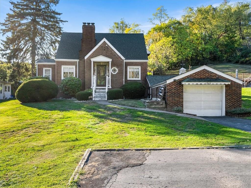 185 Highway 68 Rochester, PA 15074 - Photo 28 of 29 a front view of a house with a yard