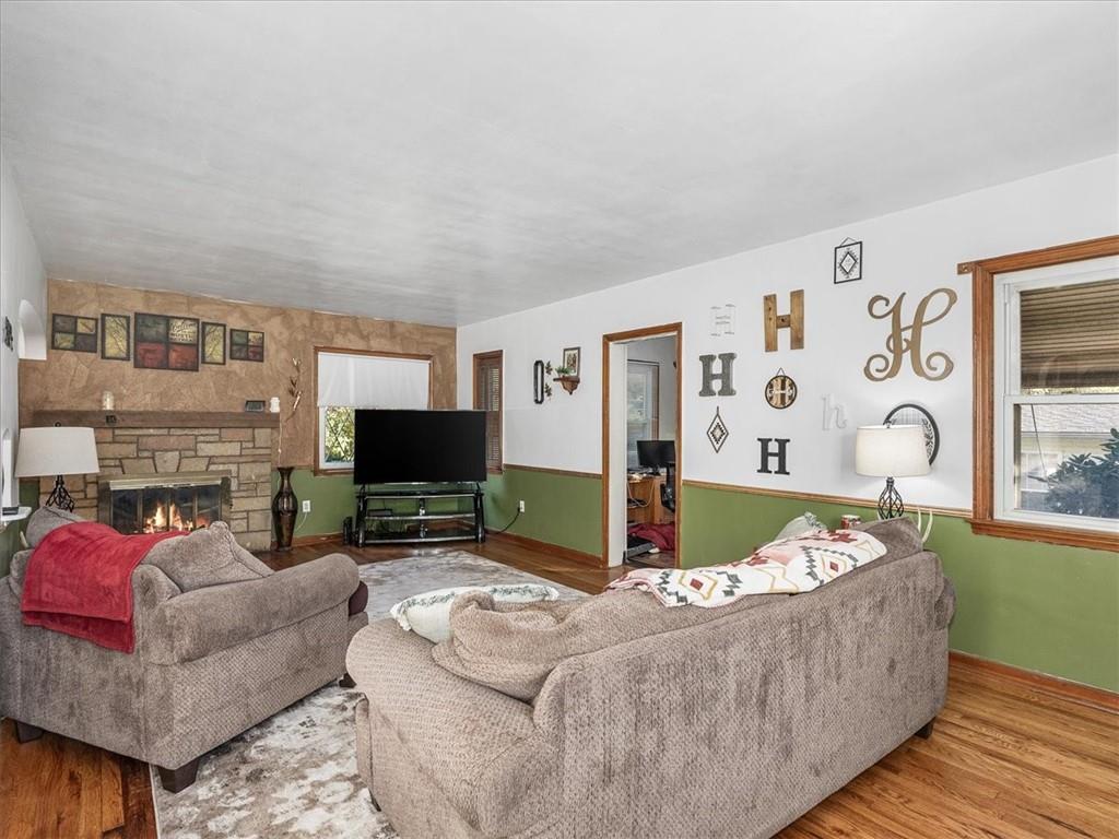 185 Highway 68 Rochester, PA 15074 - Photo 7 of 29 a living room with furniture and a flat screen tv