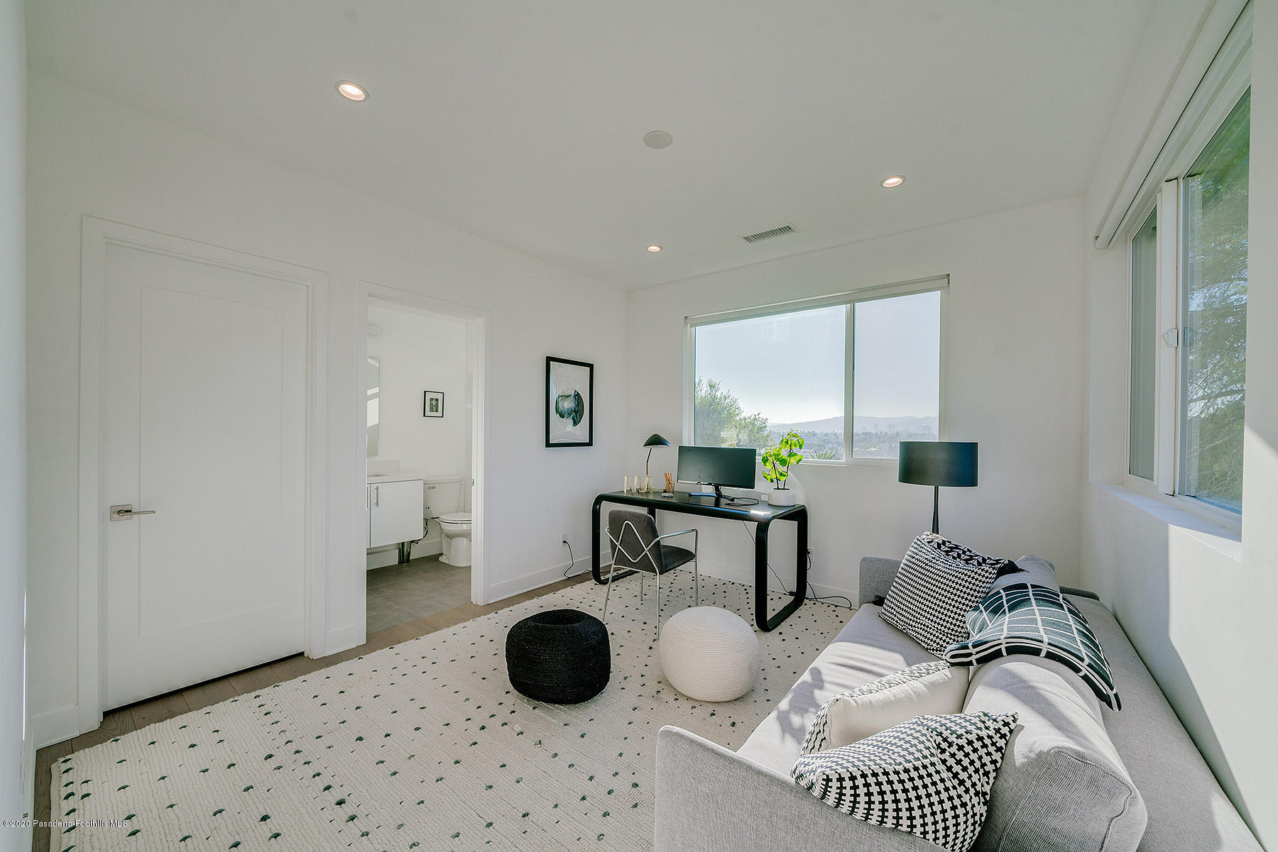 855 Hyperion Avenue Los Angeles, CA 90029 - Photo 18 of 35 a living room with furniture and a window