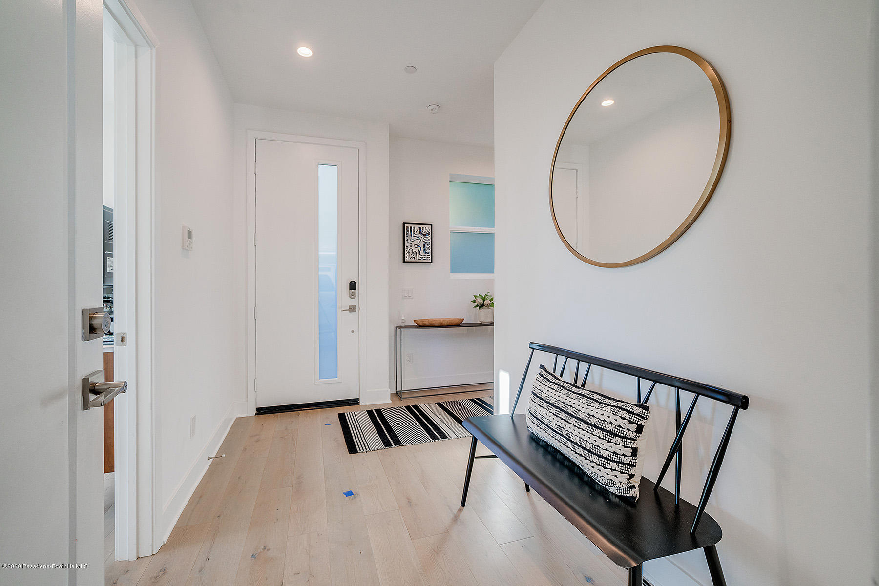 855 Hyperion Avenue Los Angeles, CA 90029 - Photo 27 of 35 a view of a hallway with wooden floor and entryway