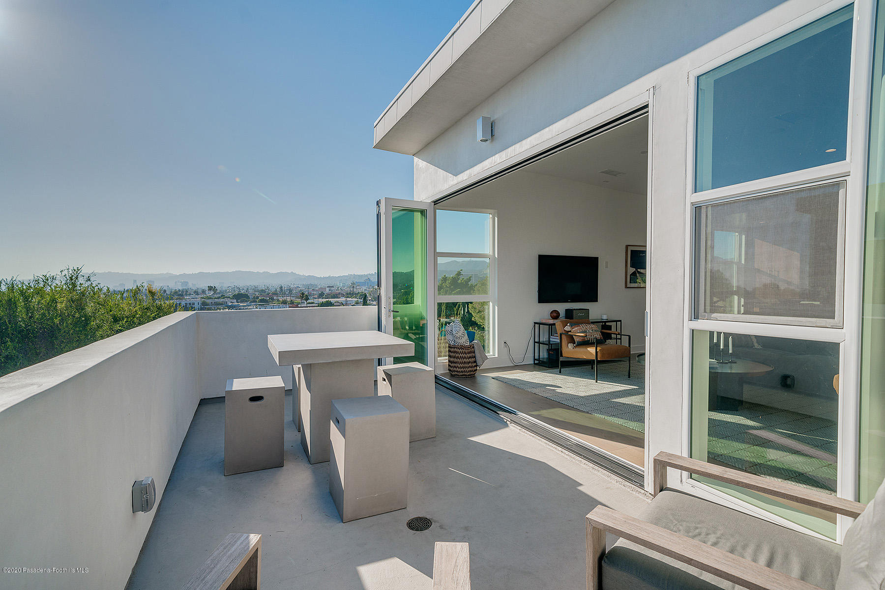 855 Hyperion Avenue Los Angeles, CA 90029 - Photo 6 of 35 a view of a living room and a floor to ceiling window