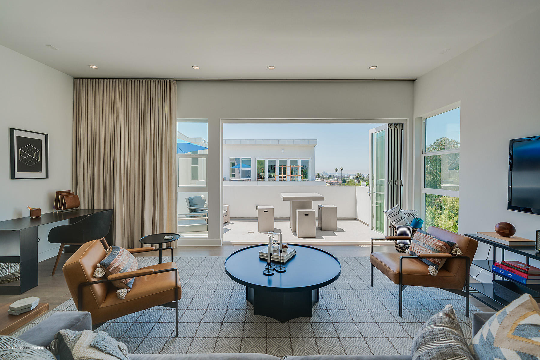 855 Hyperion Avenue Los Angeles, CA 90029 - Photo 8 of 35 a living room with furniture and a large window
