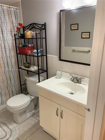a bathroom with a sink and a toilet