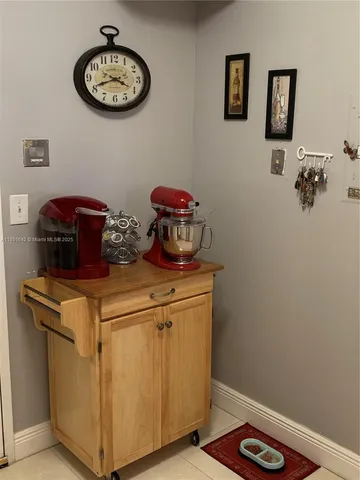 a kitchen with stainless steel appliances a stove and a microwave
