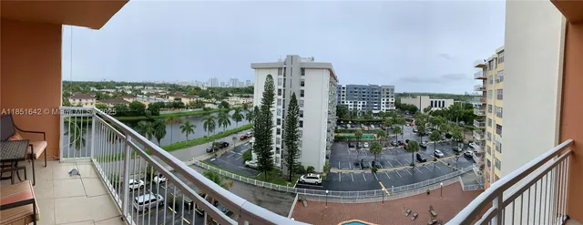 a view of a balcony with an ocean view