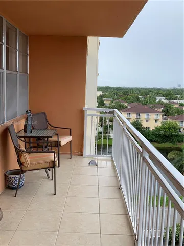 a view of a city skyline from a balcony