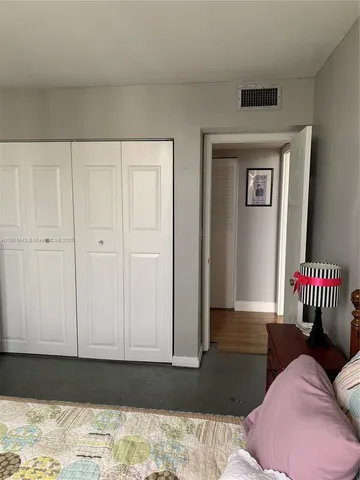 a view of a livingroom with furniture