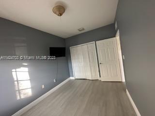 3390 Northeast 11th Drive, Unit 3390 Homestead, FL 33033 - Photo 12 of 20 an empty room with windows