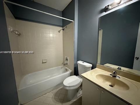 3390 Northeast 11th Drive, Unit 3390 Homestead, FL 33033 - Photo 14 of 20 a bathroom with a sink toilet and shower