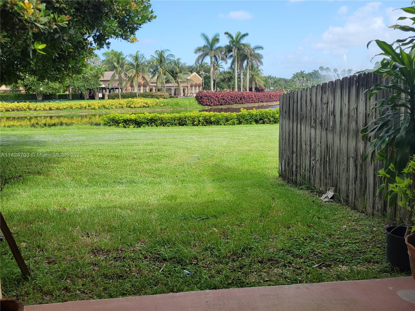 3390 Northeast 11th Drive, Unit 3390 Homestead, FL 33033 - Photo 18 of 20 a huge green field with lots of bushes
