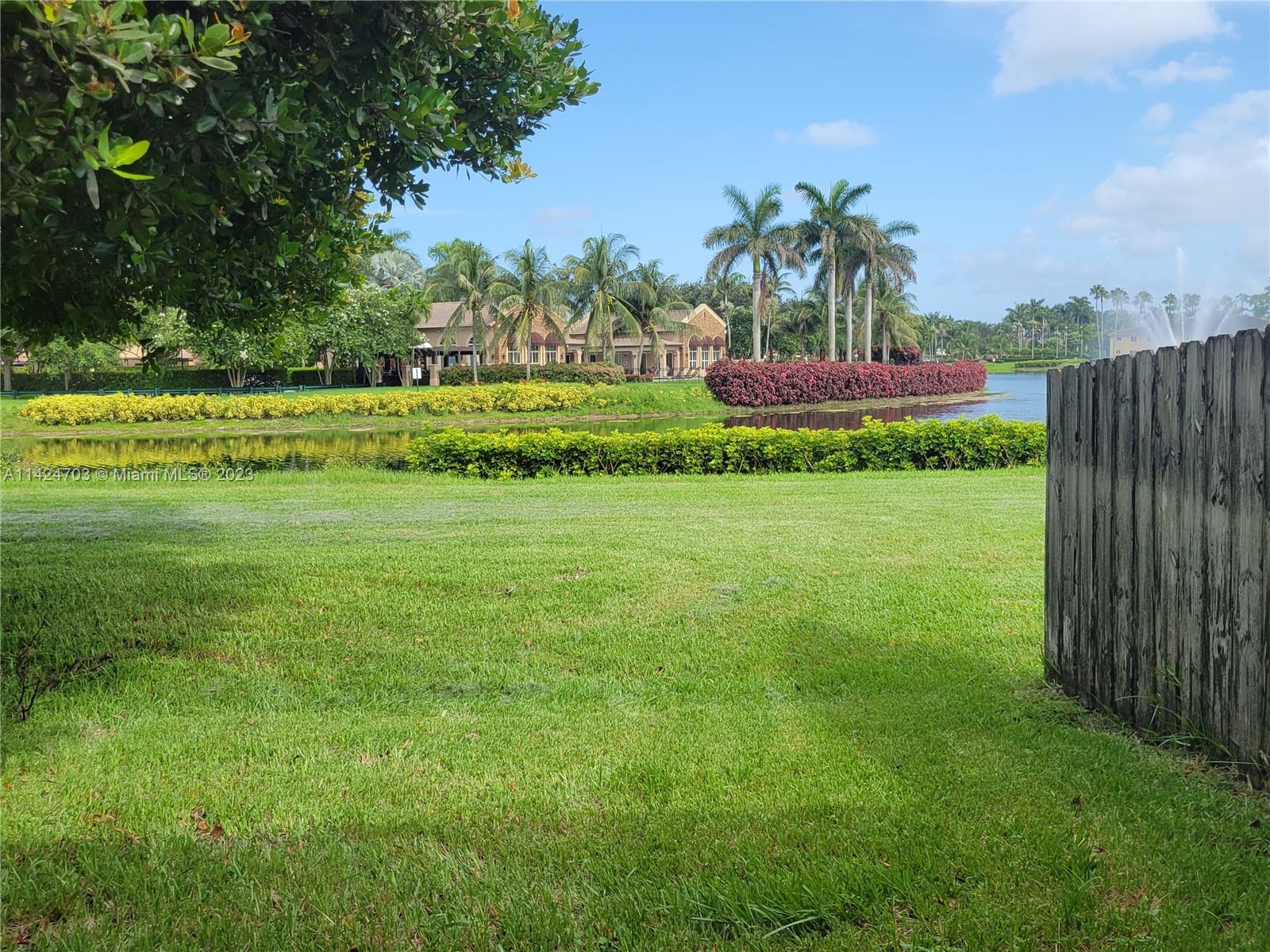 3390 Northeast 11th Drive, Unit 3390 Homestead, FL 33033 - Photo 20 of 20 a view of a golf course with a garden